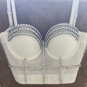 Up for sale is a NWOT white style bustier size small
